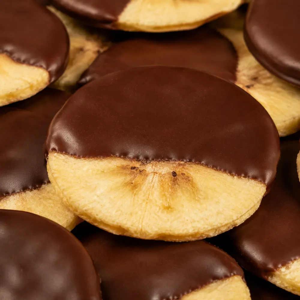 Banana liofilizada drageada com chocolate ao leite